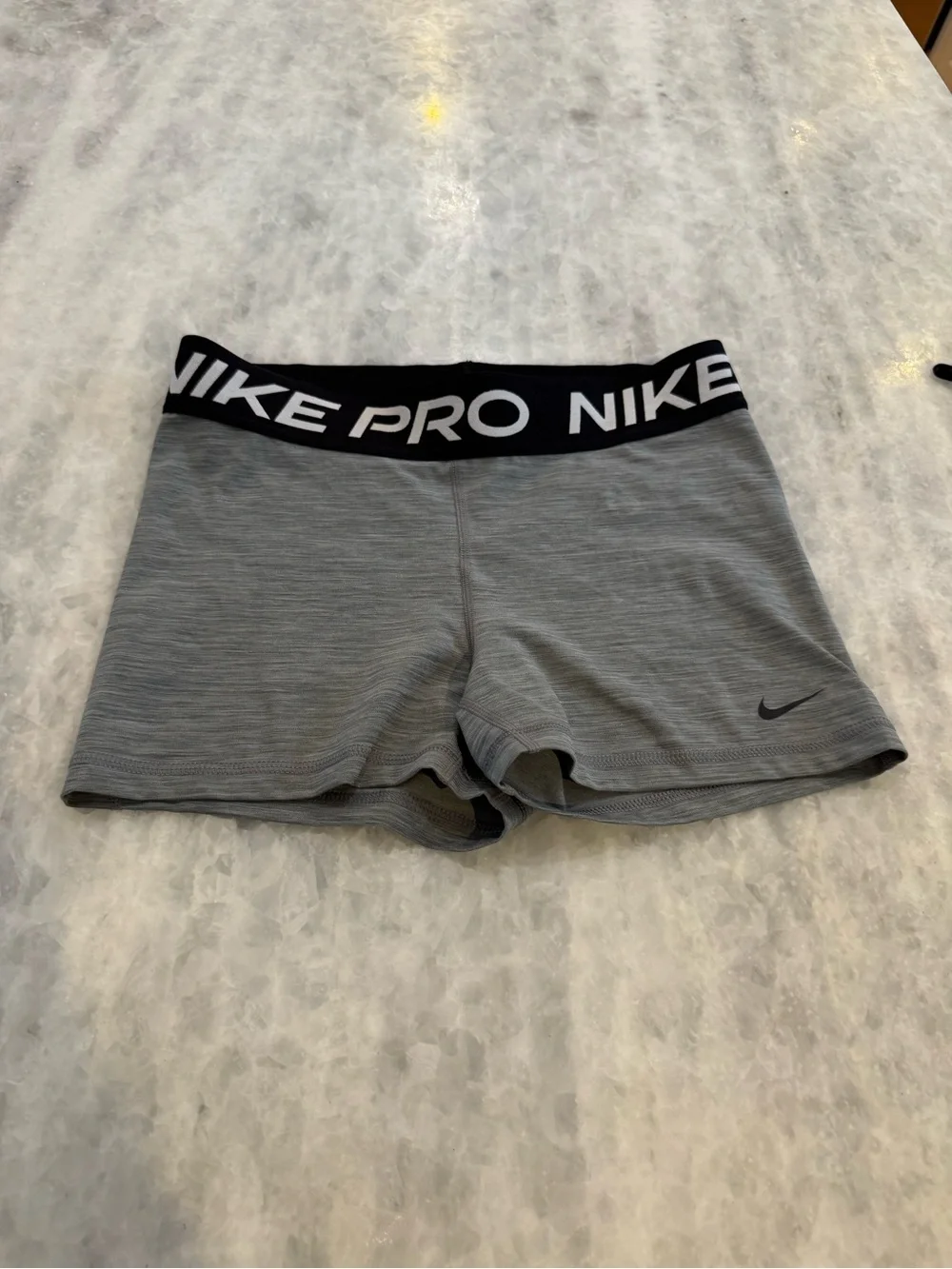 Nike Pro Gray Women's Athletic Shorts with Black Branded Waistband